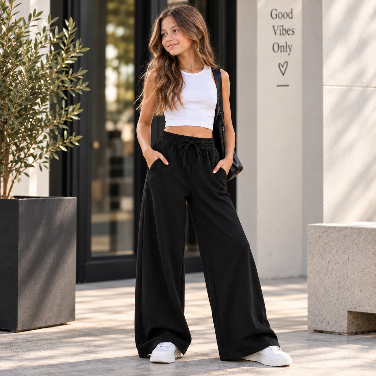 Schwarze Mädchen-Wide-Leg-Sweathose mit elastischem Bund