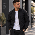 Schwarze Herren-Bomberjacke mit Stehkragen