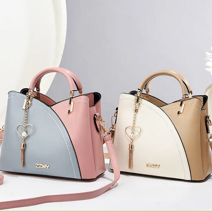 Elegante Damenhandtasche mit Tragegriff und Schulterriemen