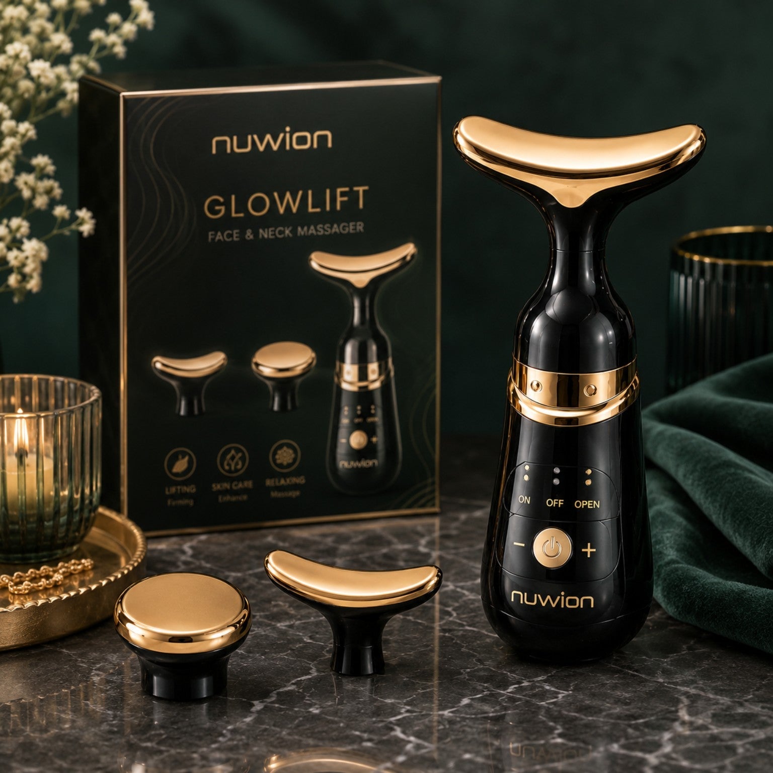 GlowLift Gesichtsmassagegerät in Schwarz und Gold mit austauschbaren Aufsätzen